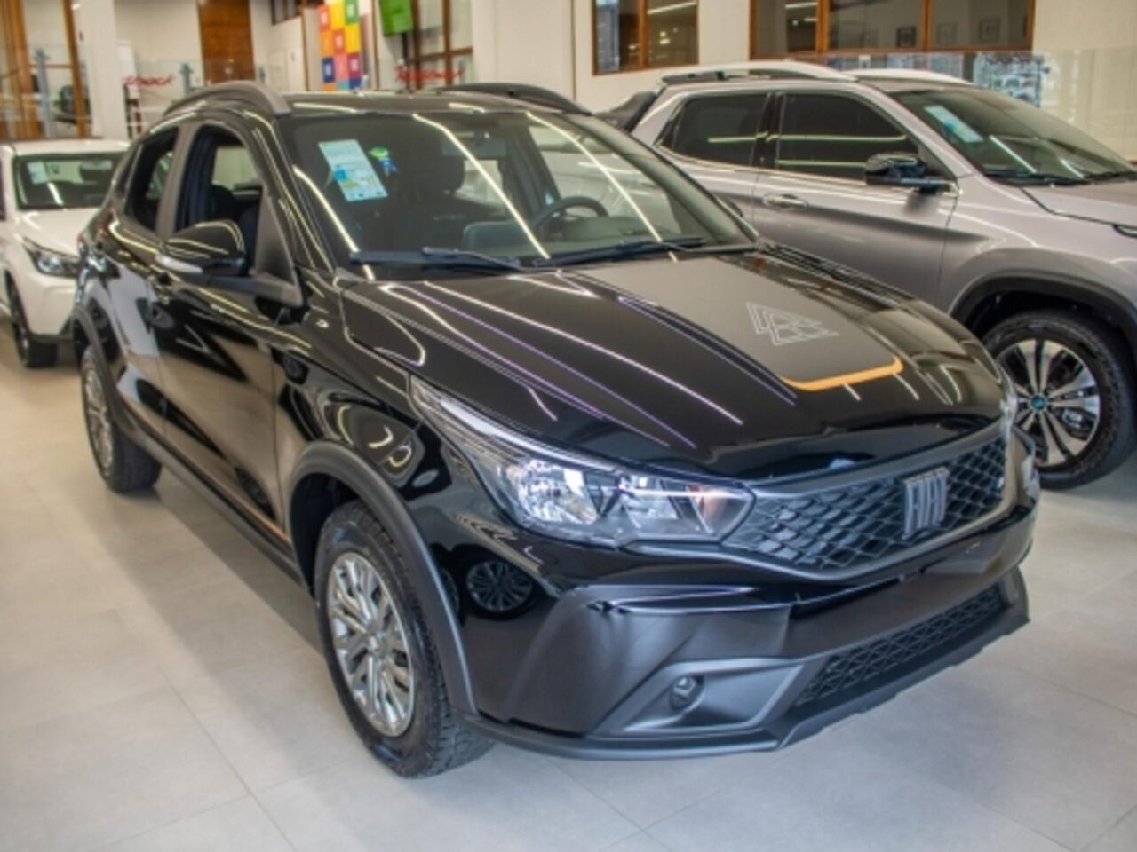 fiat argo 1.3 firefly flex trekking manual wmimagem15570521339 Entre os carros mais vendidos no até o dia 2 de maio de 2023, o Fiat Mobi está iniciando na liderança com 639 unidades emplacadas, o subcompacto vendeu 4.686 unidades no mês de março, ficando entre os dez mais comercializados. Na segunda posição, o Argo guardou 516 unidades, seguido pela Strada que conseguiu registrar 350 unidades, segundo o mais recente levantamento da Federação Nacional da Distribuição de Veículos Automotores, a Fenabrave.