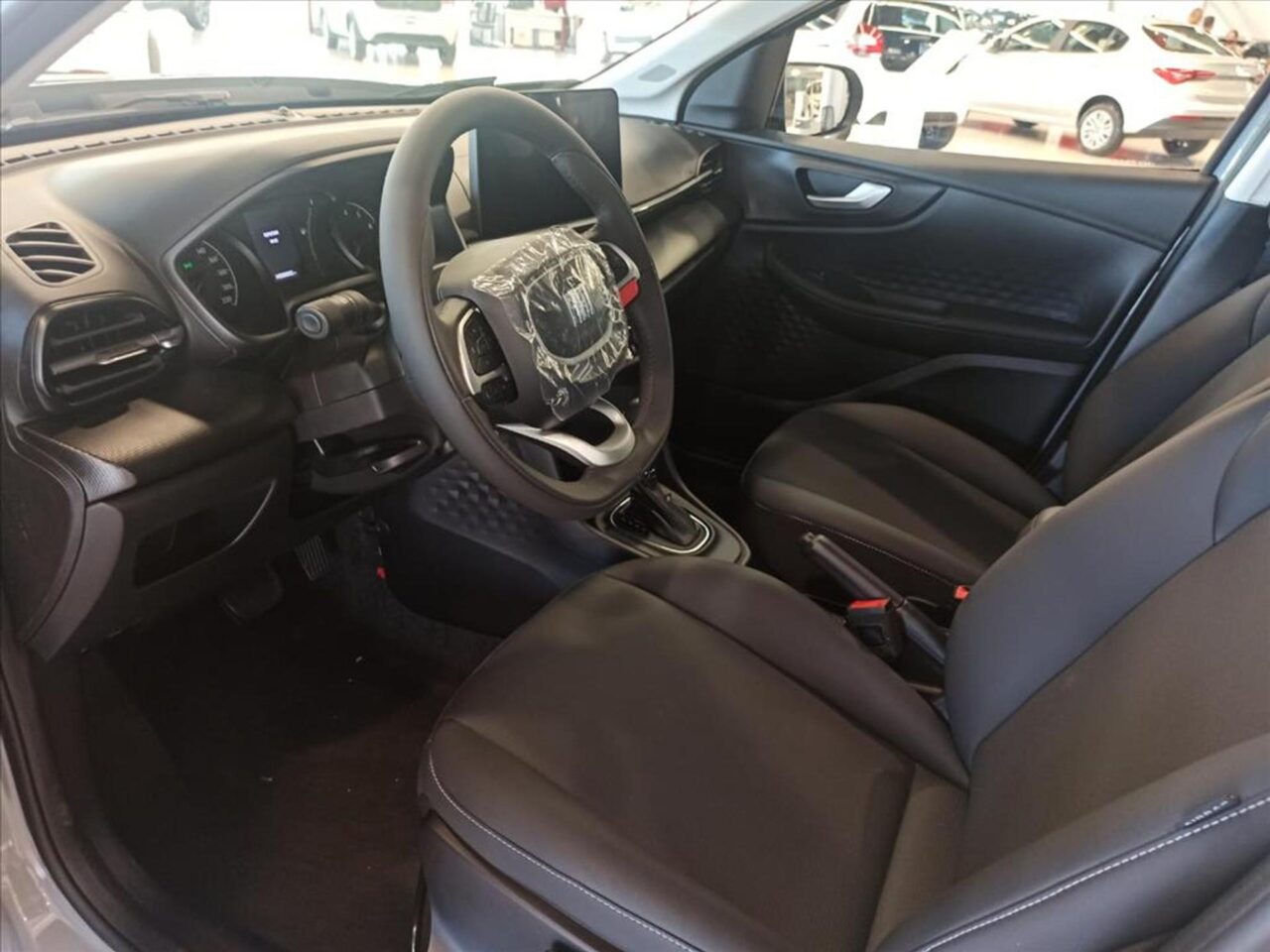 fiat pulse 1.3 flex drive manual wmimagem10393173597 O SUV apresenta uma ampla gama de equipamentos e recursos que proporcionam uma experiência completa ao usuário. Além disso, o Fiat Pulse passou por ajustes de preços para a linha 2024, além de introduzir a nova versão S-Design