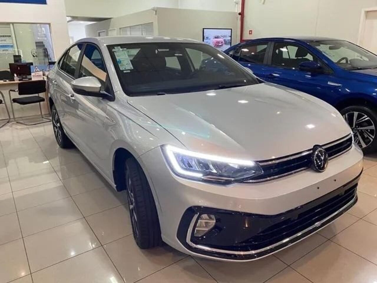 volkswagen virtus 1.0 200 tsi highline automatico wmimagem08584712432 O sedã oferece uma ampla variedade de características voltadas para proporcionar conveniência, segurança e tecnologia avançada aos seus usuários. Além disso, o Volkswagen Virtus Comfortline possui um dos maiores porta-malas de sua categoria, amplo espaço interno e uma extensa lista de equipamentos