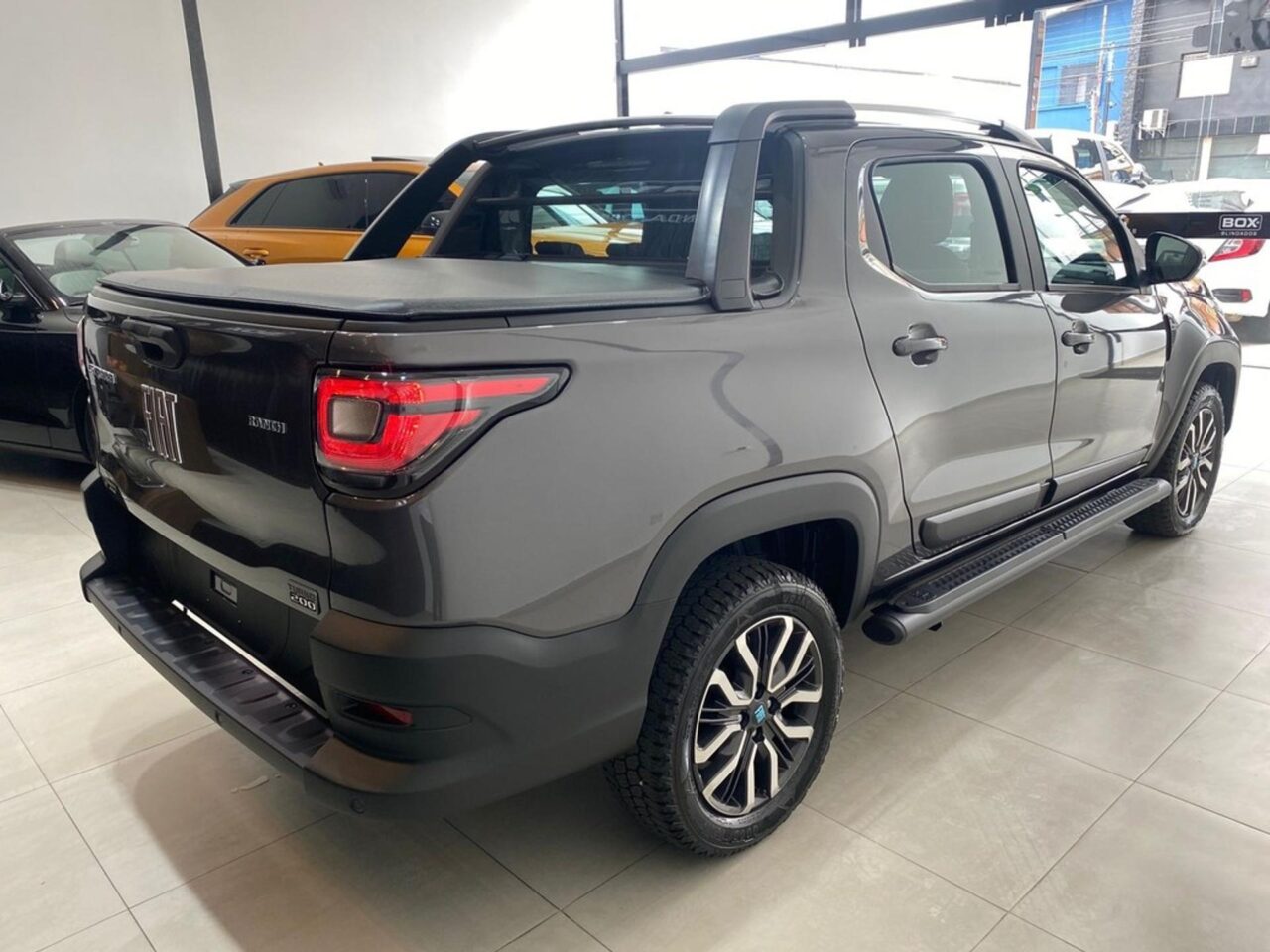 fiat strada 1.0 turbo 200 flex ranch cd cvt wmimagem11083825550 Abaixo listamos os prós e contras da Fiat Strada Ranch 2024, uma das versões topo de linha da marca italiana