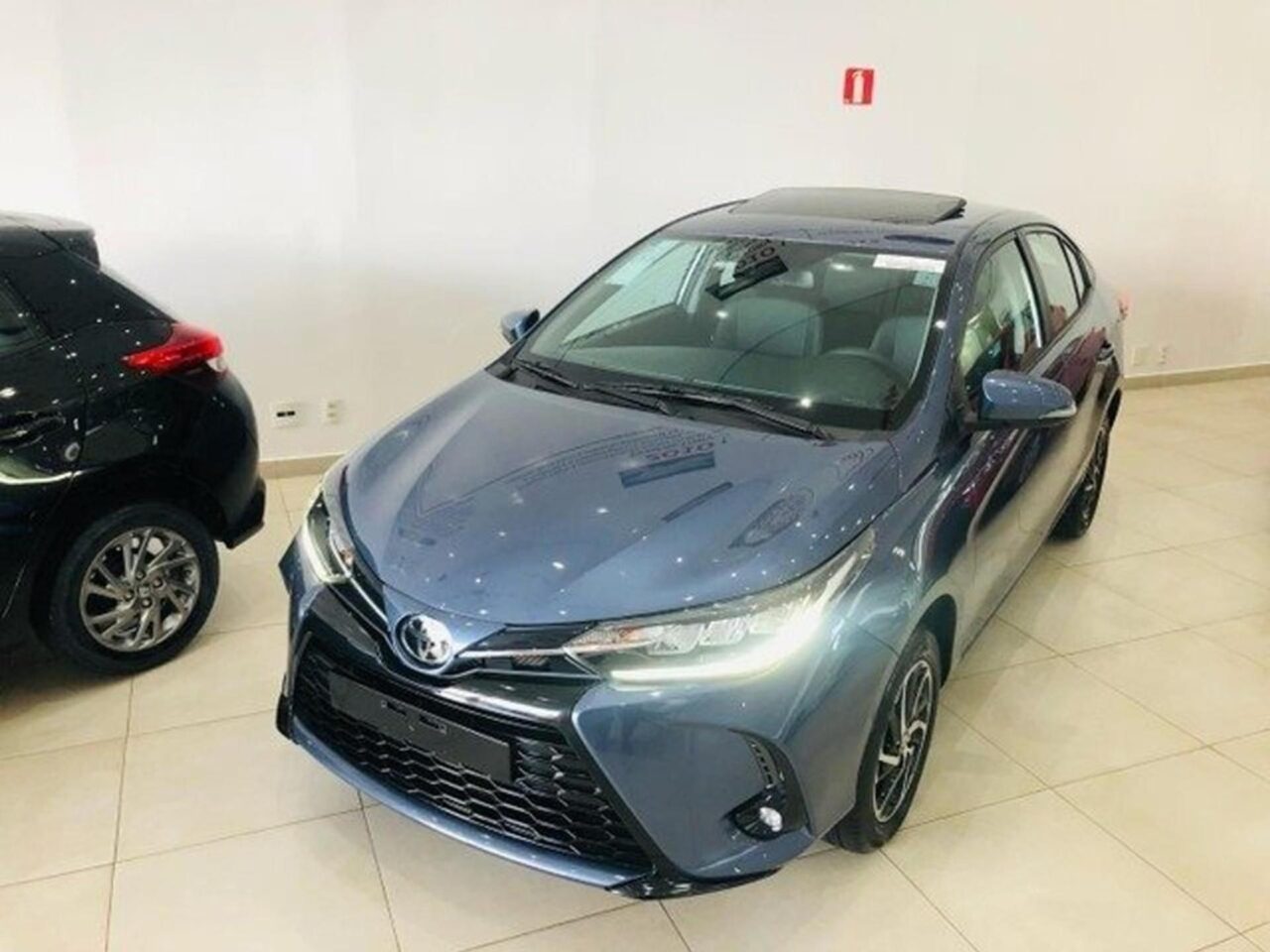 toyota yaris 1.5 16v flex sedan xls multidrive wmimagem15213853810 1 Embora seja uma versão de entrada, o Toyota Yaris Sedan XL 2024 possui características atrativas, como um porta-malas espaçoso e uma boa lista de equipamentos