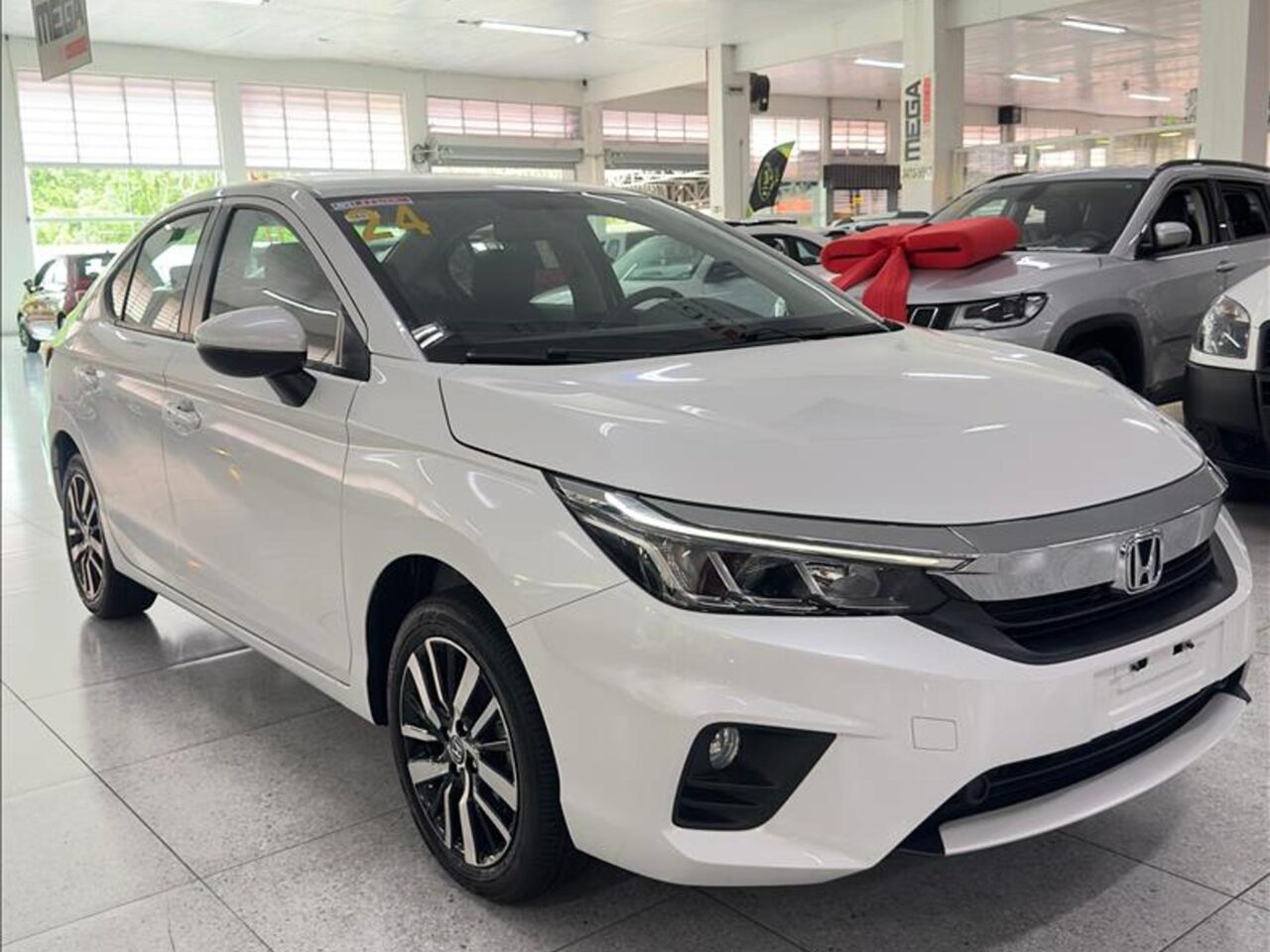 honda city 1.5 ivtec flex ex cvt wmimagem17454468676 A versão intermediária, que oferece uma boa relação custo-benefício, o Honda City Sedan EX 2024, dispõe de uma extensa lista de equipamentos